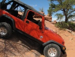 What we discovered is that photos can't convey how ridiculously steep this is.  The Jeep would slide down the rock.  