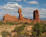 Balancing rock.  This thing is huge, and it looks like the CG of the rock is right on the edge of the pillar.