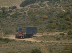 We get to the top, and see a truck carrying parts for an oil rig up a different road.