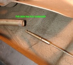 Just pull on the cable underneath the car and it'll come out.