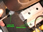 The nuts on the side only need to be loosened.  The bracket has grooves there
so will slide straight up once the rear screws are removed.
